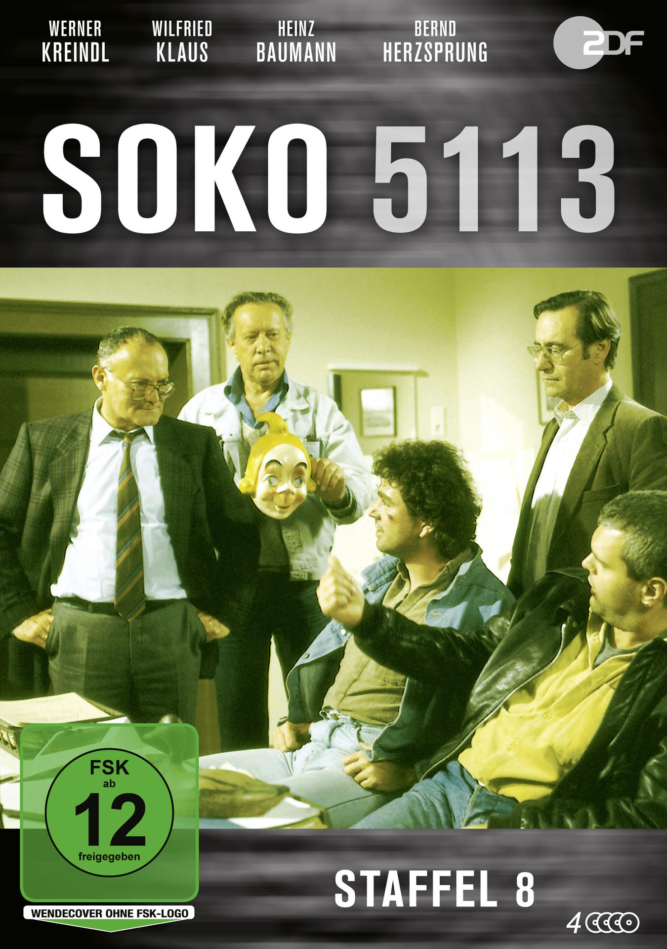 Soko 5113, DVD-Cover. Menschen in einem Raum, ein Mann hält eine Maske. Text oben.
