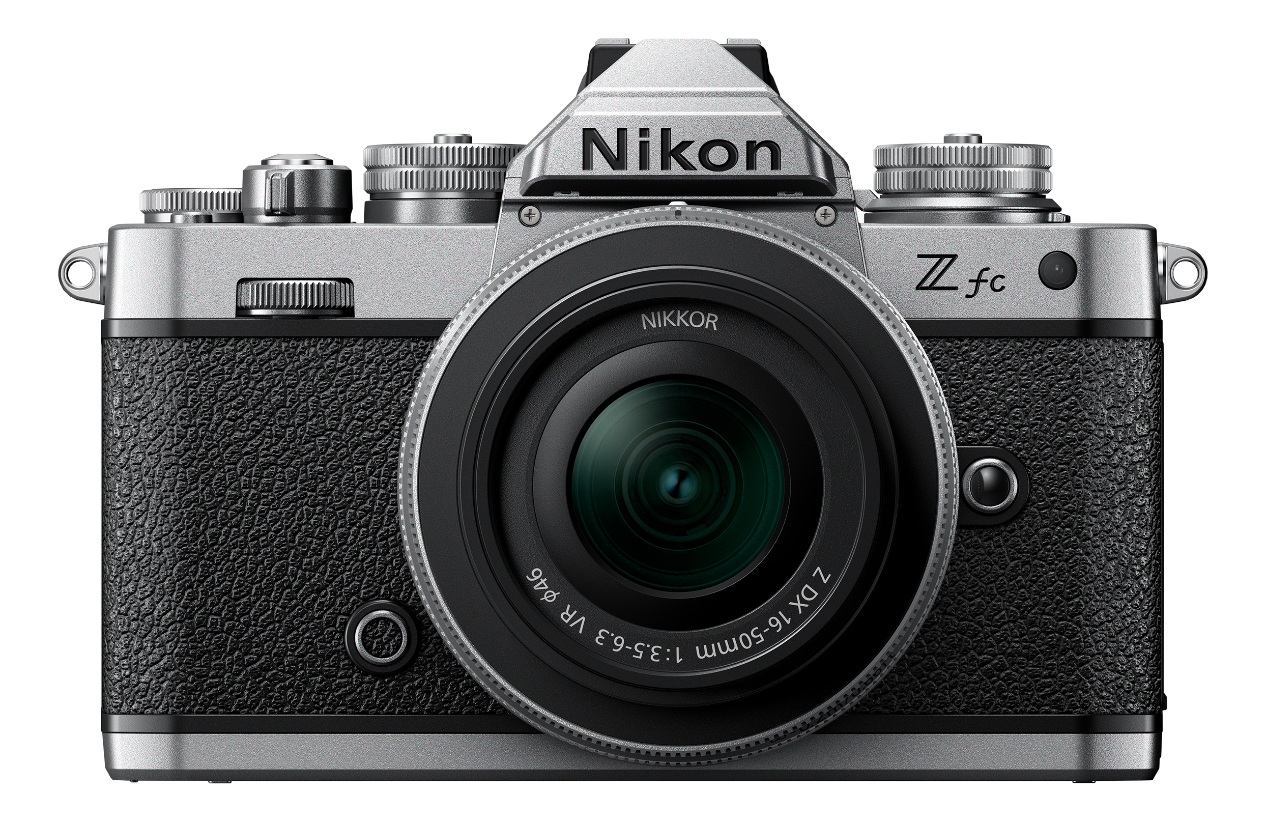 Appareil photo Nikon Z fc argenté avec objectif, poignée noire.