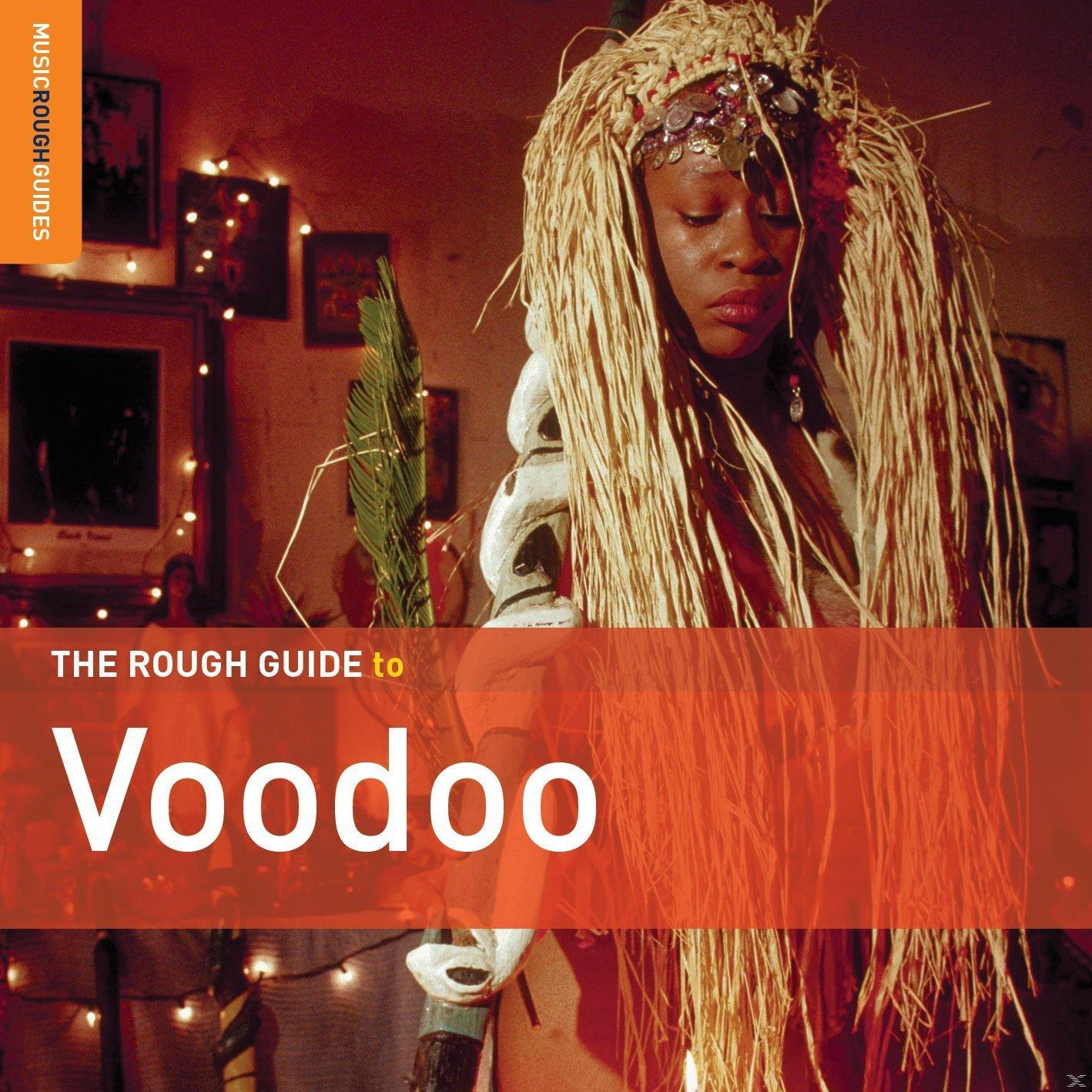 Könyvborító: The Rough Guide to Voodoo. Egy nő fejfedővel, narancssárga háttérrel.