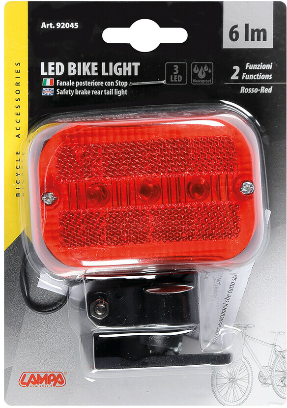 Piros LED-es kerékpárlámpa műanyag csomagolásban. A csomagon szöveg és képek vannak.