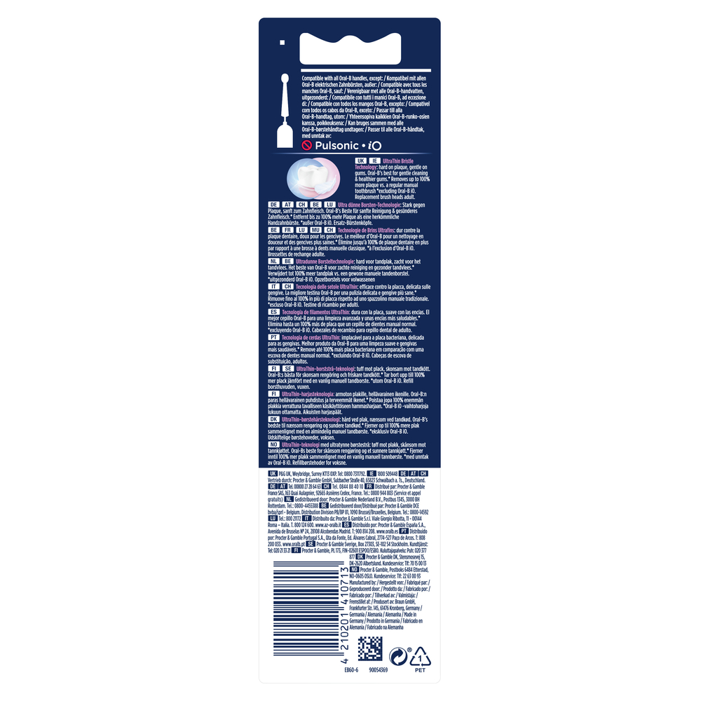 Verpackung mit Text in mehreren Sprachen, Zahnbürste und Anweisungen. Weißer Hintergrund.