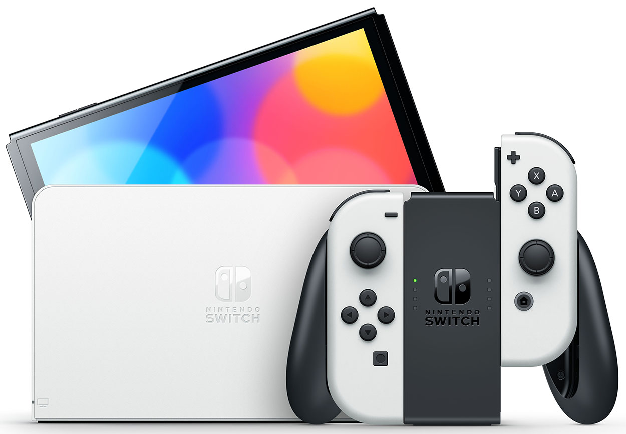 Nintendo Switch set. White console, controllers. Black and white color scheme.