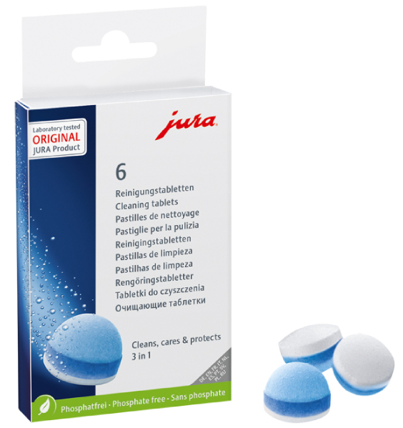 Schachtel mit Jura Reinigungstabletten. Drei Tabletten sind neben der Schachtel sichtbar.