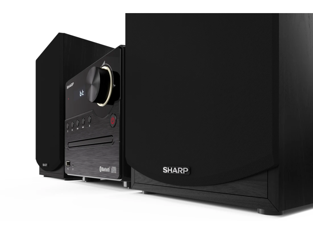 Sistema estéreo Sharp negro con dos altavoces, reproductor de CD y Bluetooth.