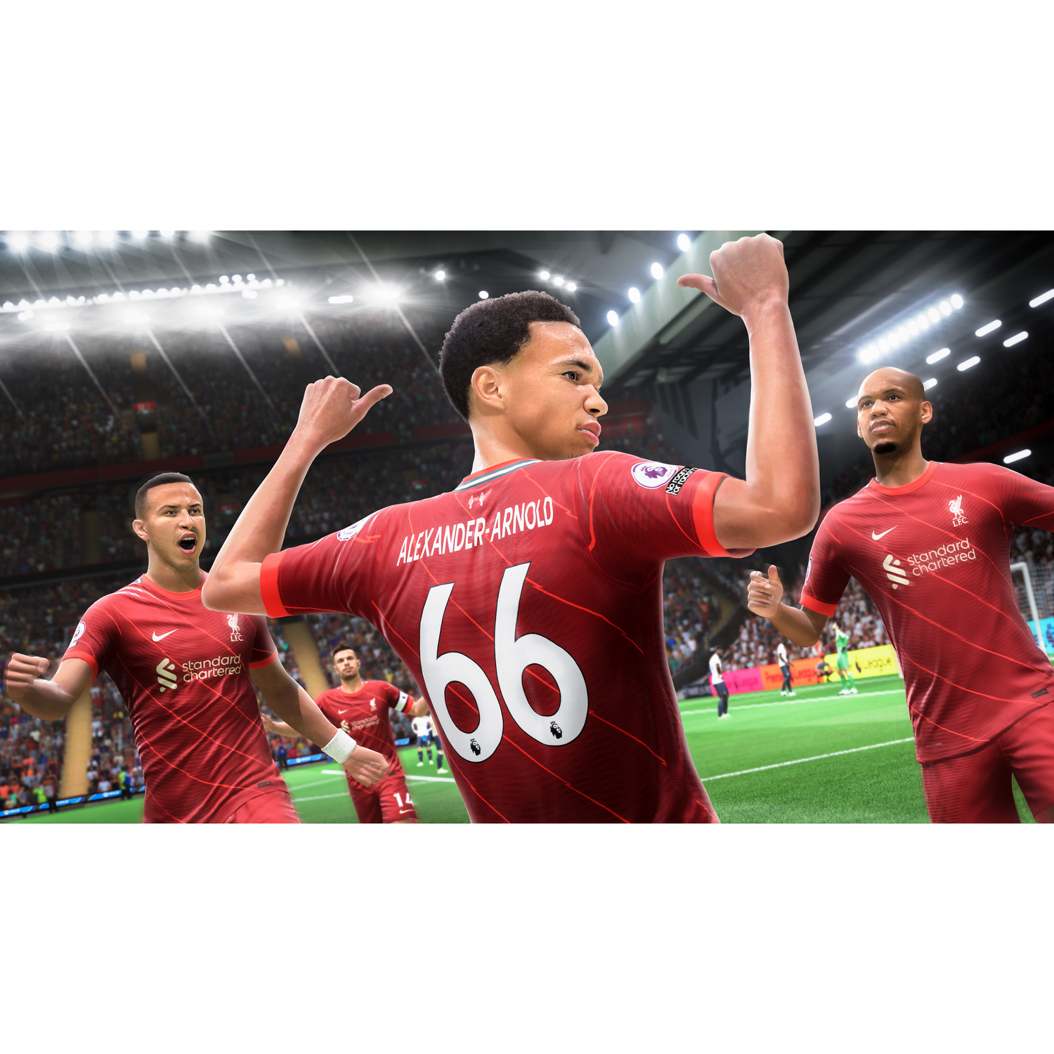Escena de un partido de fútbol. Jugadores con uniformes rojos celebran un gol en un estadio lleno.