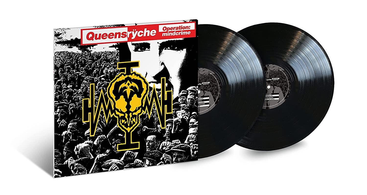 Albumcover, zwei schwarze Schallplatten, Bandname und Albumtitel.