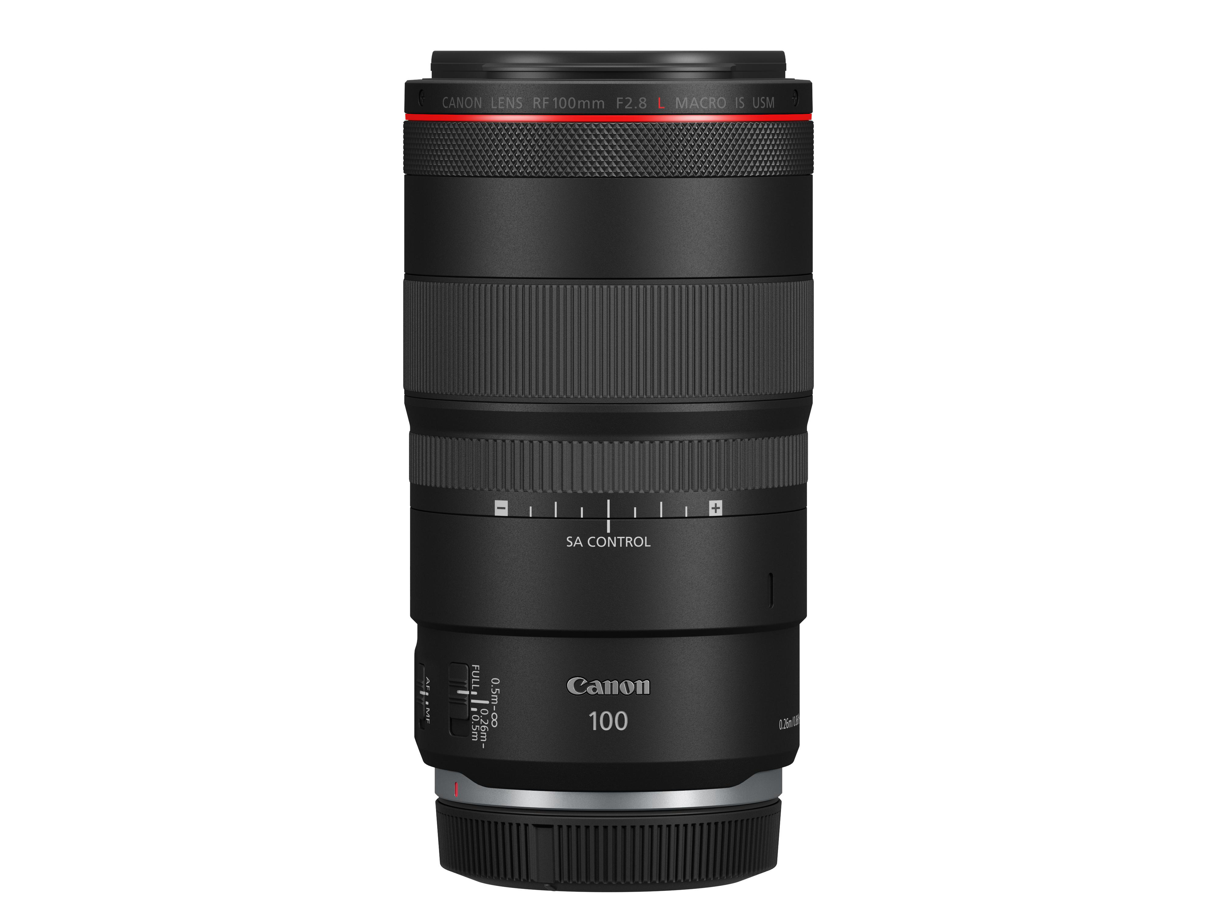 Ein Canon RF 100mm Makroobjektiv. Es ist schwarz, zylindrisch und hat einen roten Ring oben.