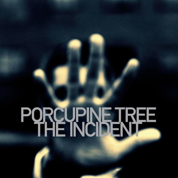 Albumcover für 'The Incident' von Porcupine Tree. Text und Hand sind scharf, mit dunklem Hintergrund.