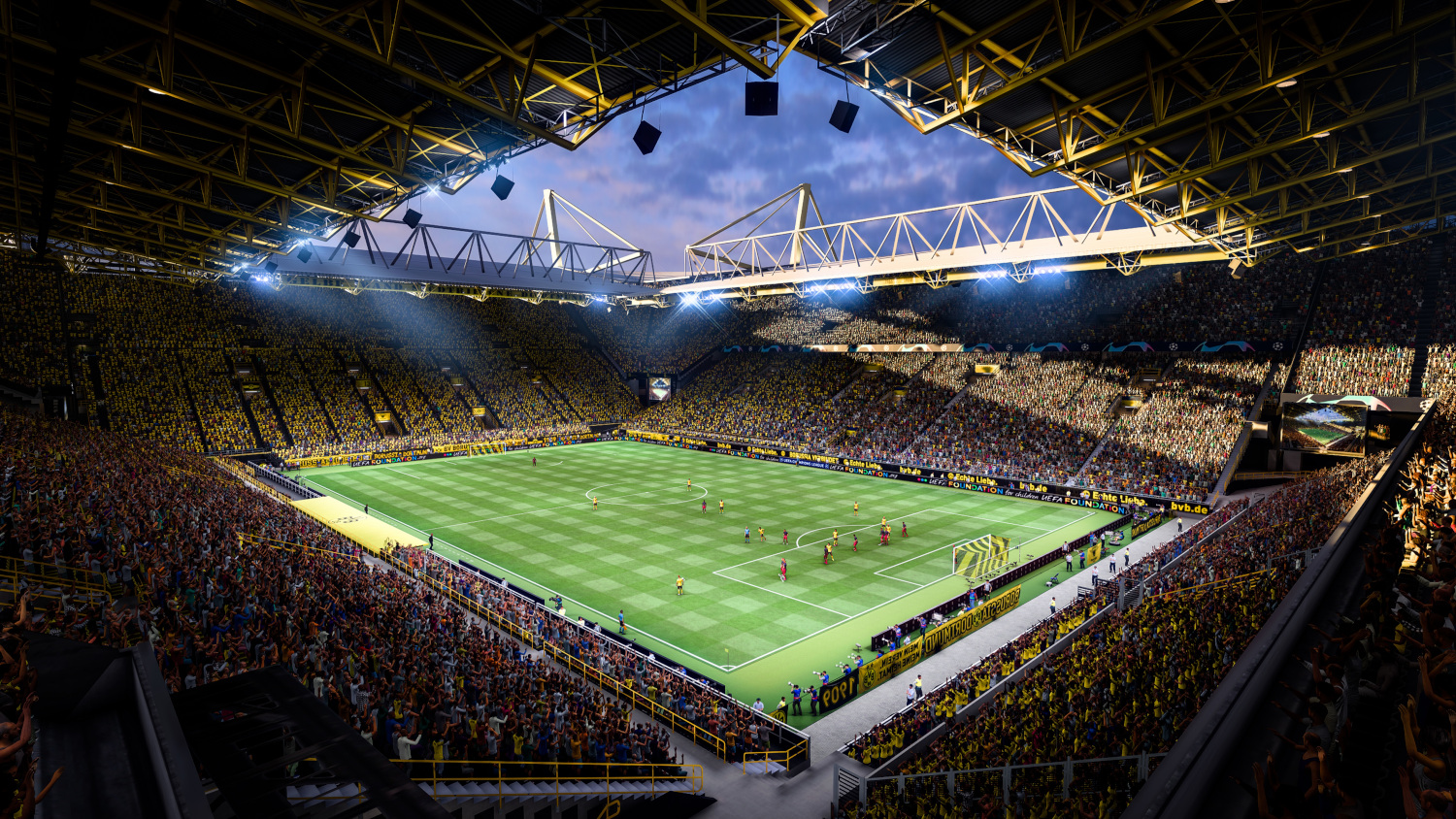 Voetbalstadion met fans op de tribunes tijdens een wedstrijd onder een bewolkte hemel.