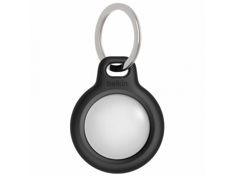 Un AirTag Belkin negro con un anillo plateado y un centro blanco.