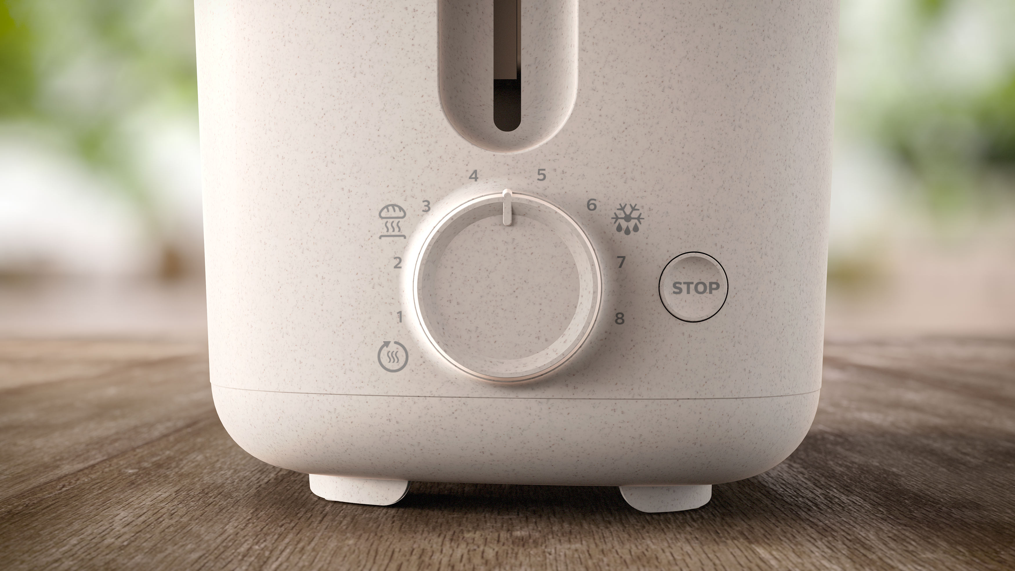 Nahaufnahme der Bedienelemente eines cremefarbenen Toasters.