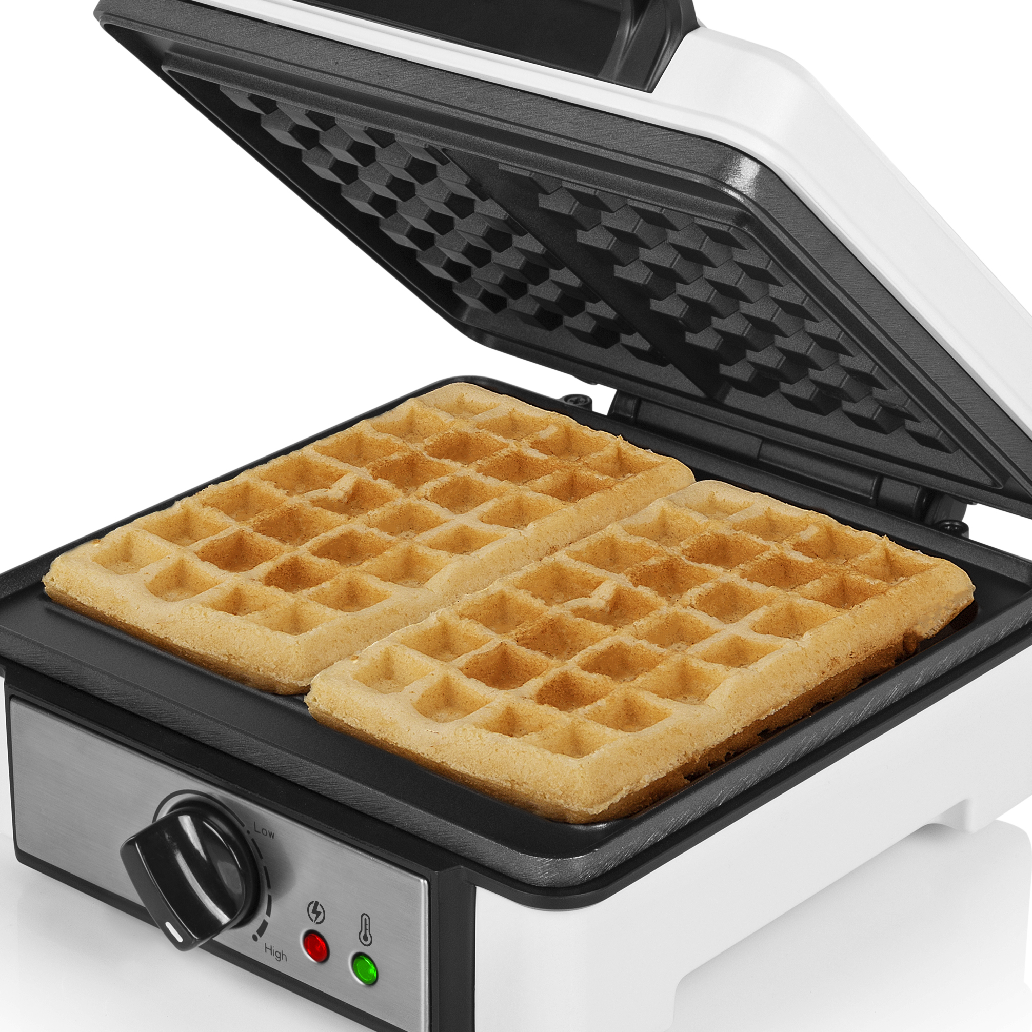 Een witte wafelijzer met wafels; open, met twee goudbruine wafels.