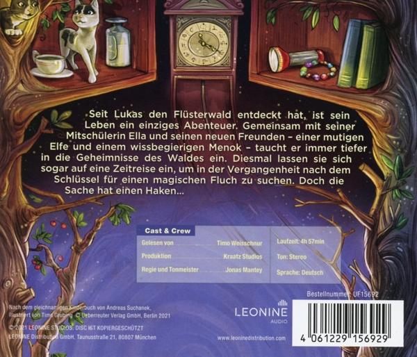 Schwarzer Handmixer auf Holztisch. Silberne Schneebesen sind befestigt.