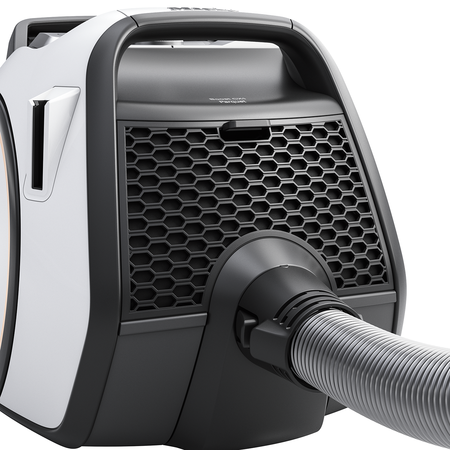 White and black vacuum cleaner, side view, with a handle, and a hose connected to the body.