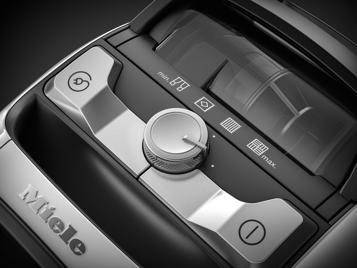 Close-up of Miele vacuum cleaner controls, with a dial and various buttons.