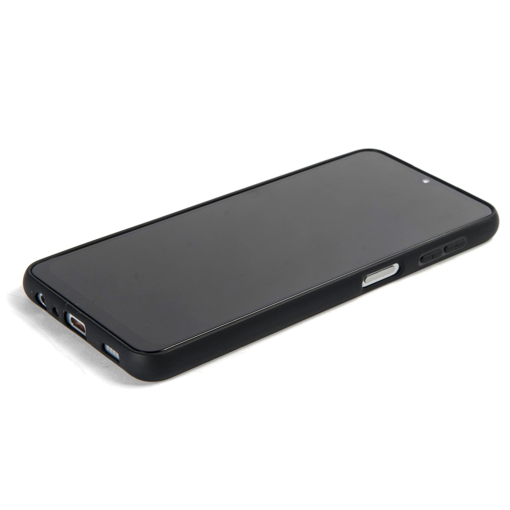 Ein schwarzes Smartphone liegt auf einer Oberfläche. Der Bildschirm ist schwarz.