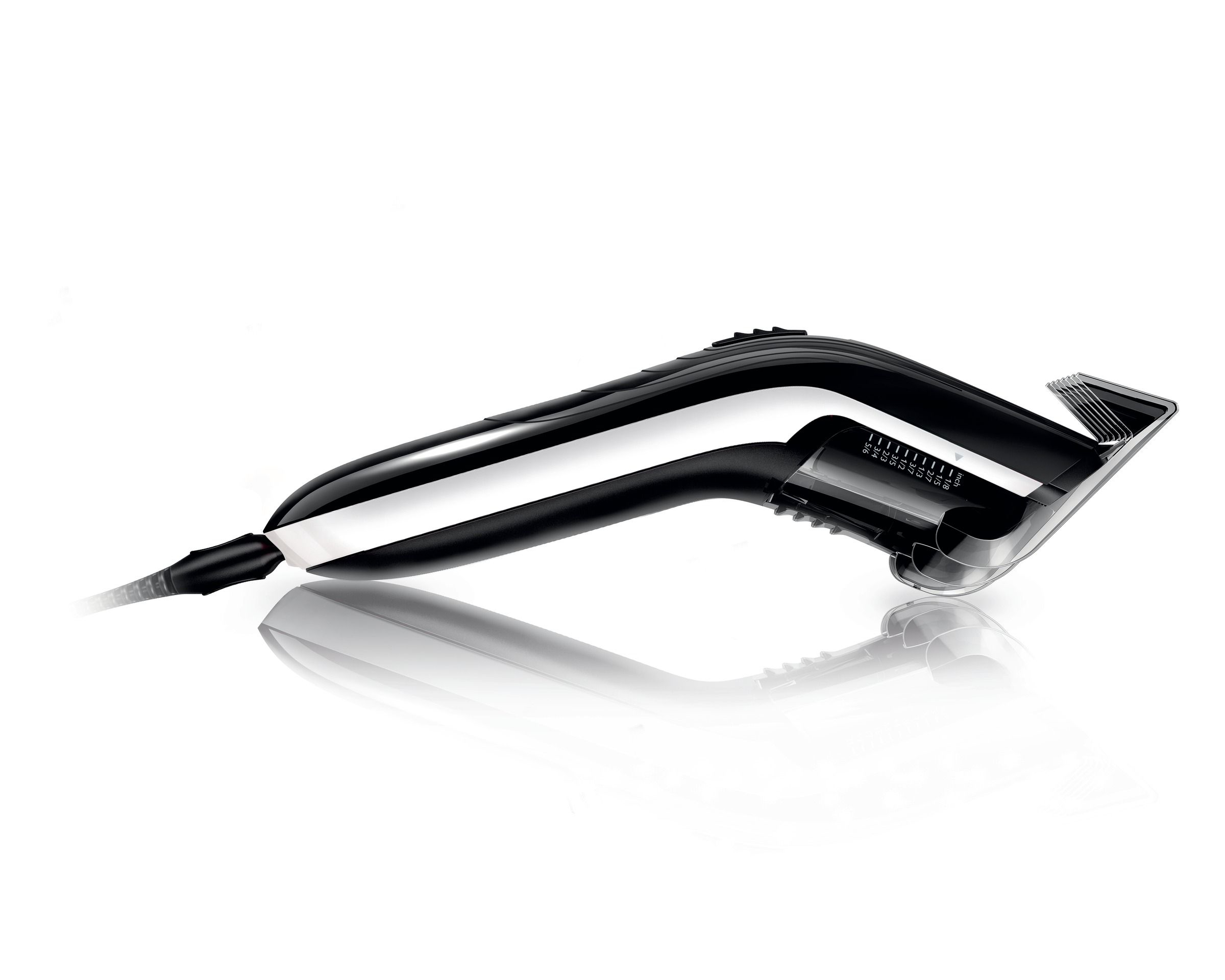 Tondeuse à cheveux Philips noire et argentée avec guide transparent, sur surface blanche.