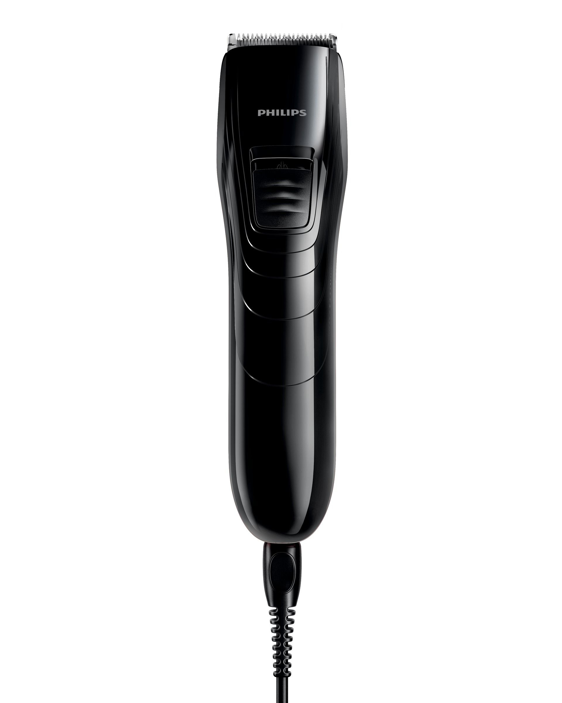 Tondeuse à cheveux Philips noire avec cordon d'alimentation sur fond blanc.