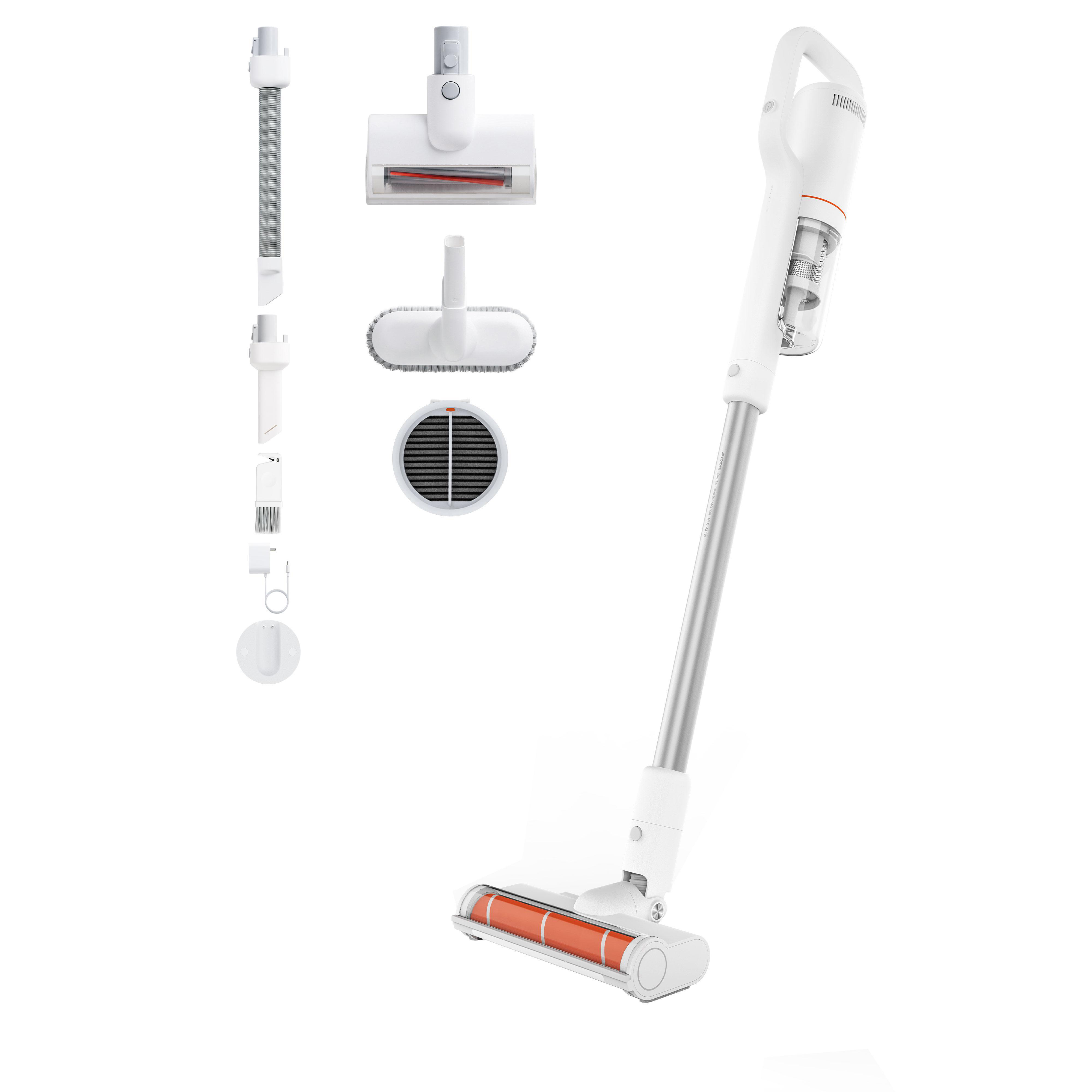 Weißer kabelloser Staubsauger zerlegt mit Zubehör. Weißer Hintergrund.