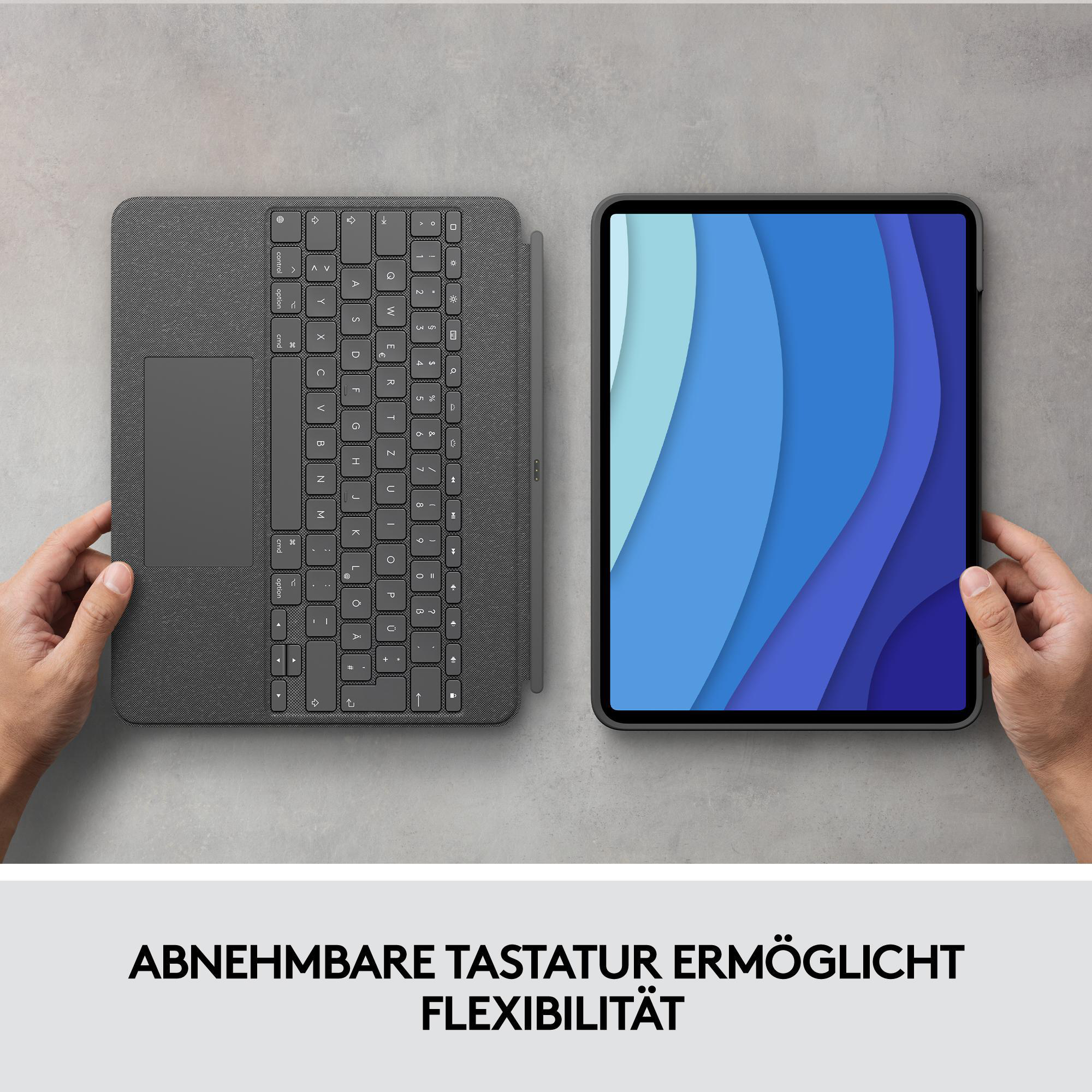 Tastatur und Tablet mit Stift auf grauer Oberfläche mit Text.