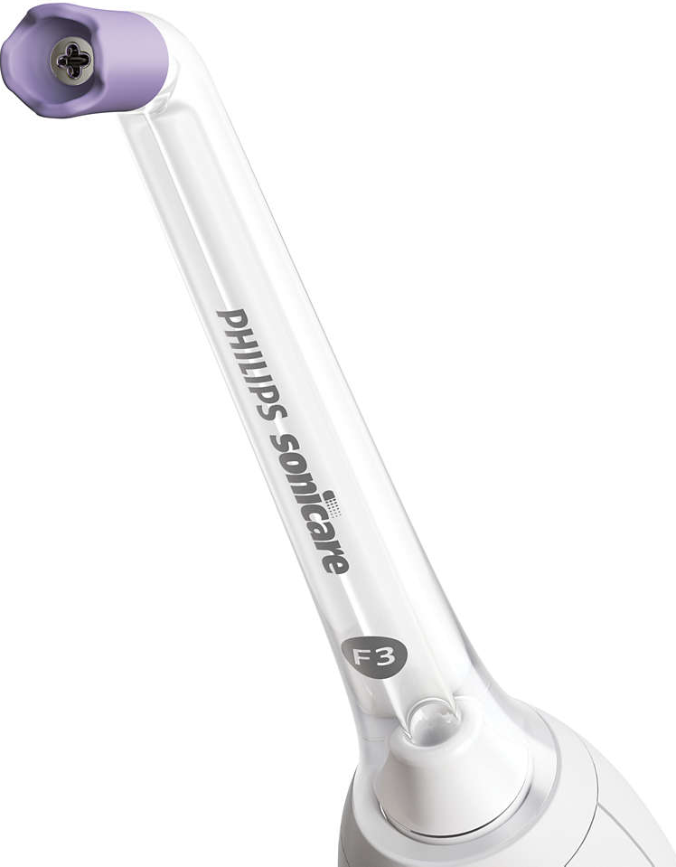 Nahaufnahme eines Philips Sonicare Zahnbürstenkopfes. Der Kopf hat lila und klare Teile.