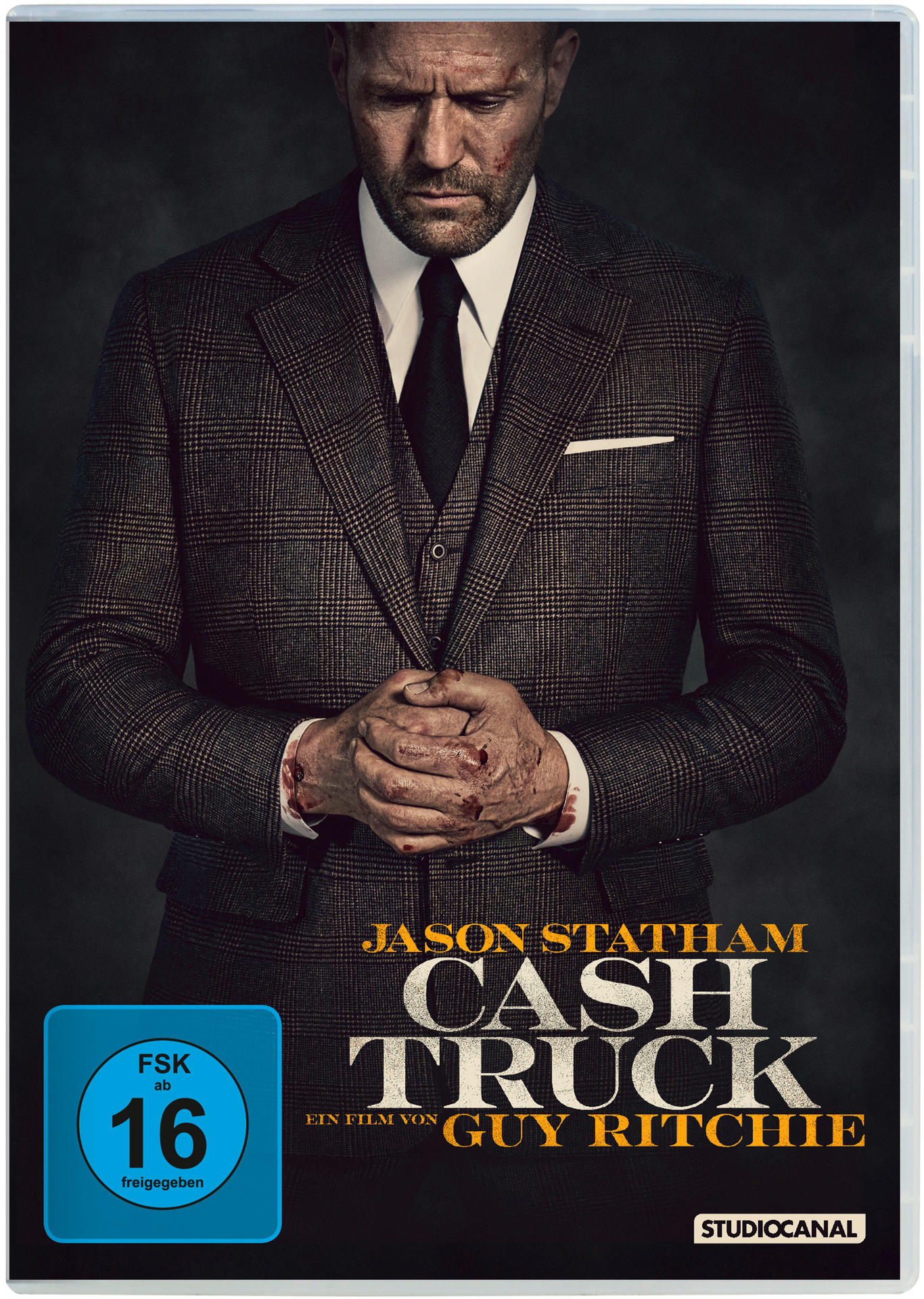 DVD-Cover mit Jason Statham im Anzug, Blut an den Händen. Titel: 'Cash Truck'.