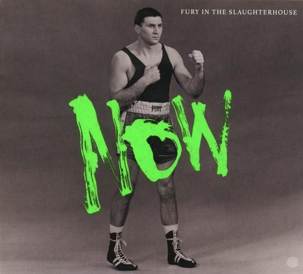 Albumcover: ein Boxer mit dem Wort NOW in Grün. Schwarzer Hintergrund.