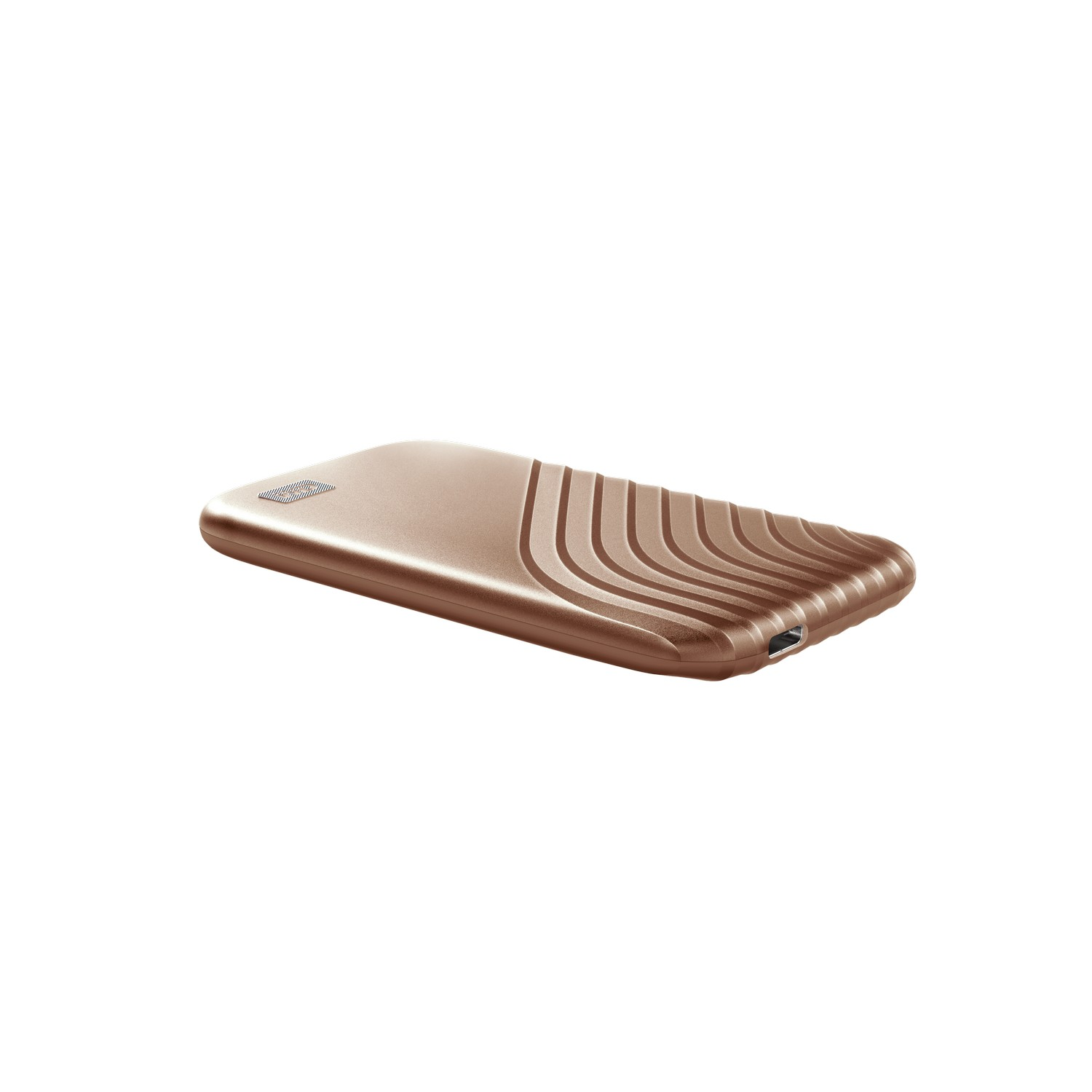 Disco duro externo de color bronce. Tiene una superficie texturizada y un puerto USB.