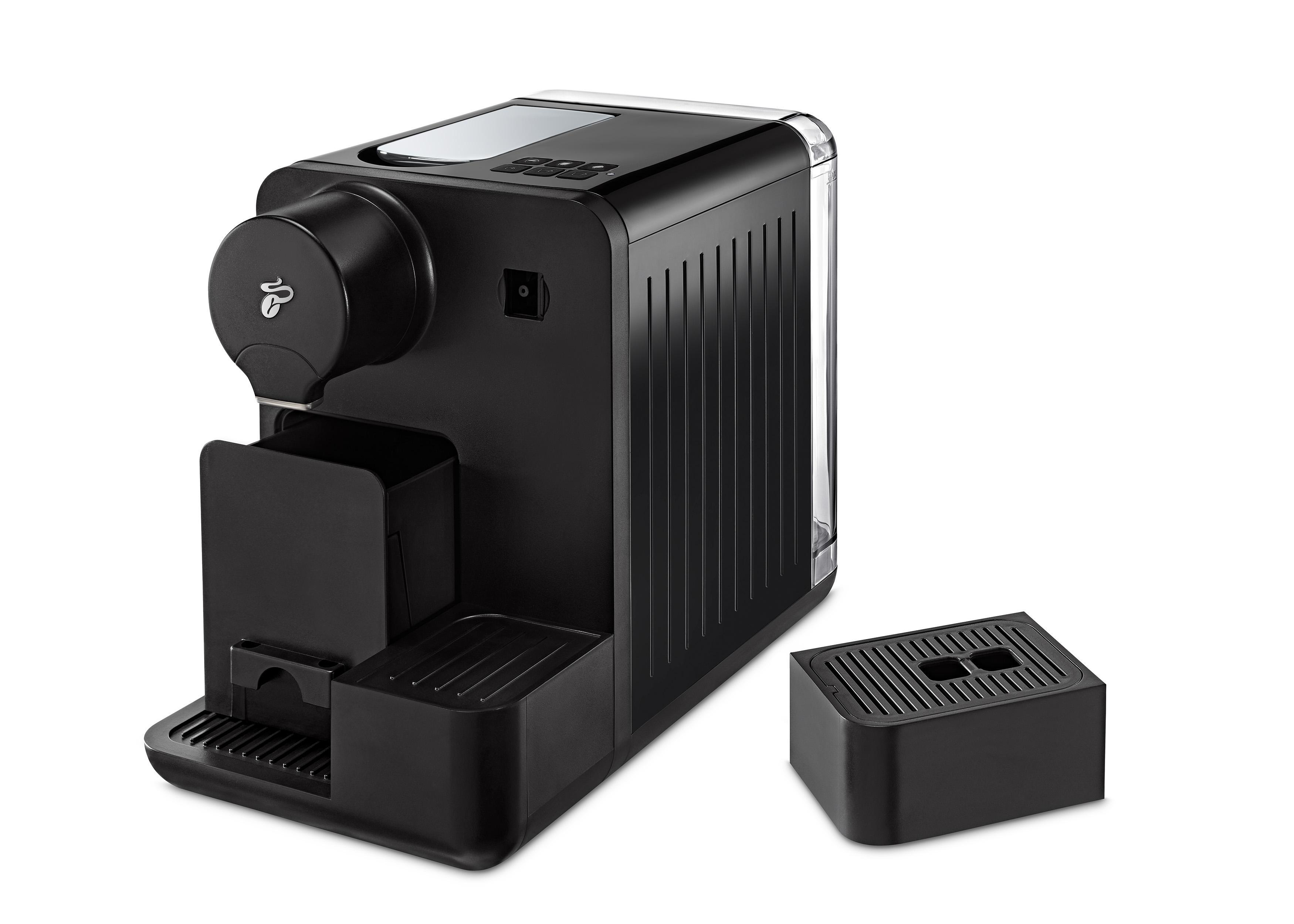 Eine schwarze Tassimo Kaffeemaschine mit herausnehmbarer Ablage und Kapselöffnung.
