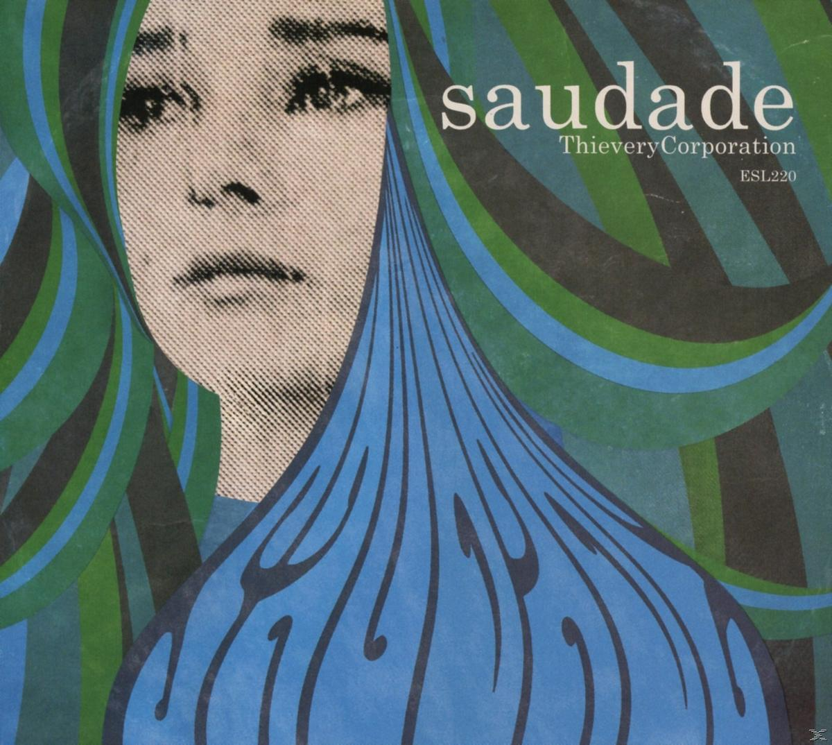 Album borító egy nő arcával és kék-zöld mintákkal, szöveg: saudade Thievery Corporation.
