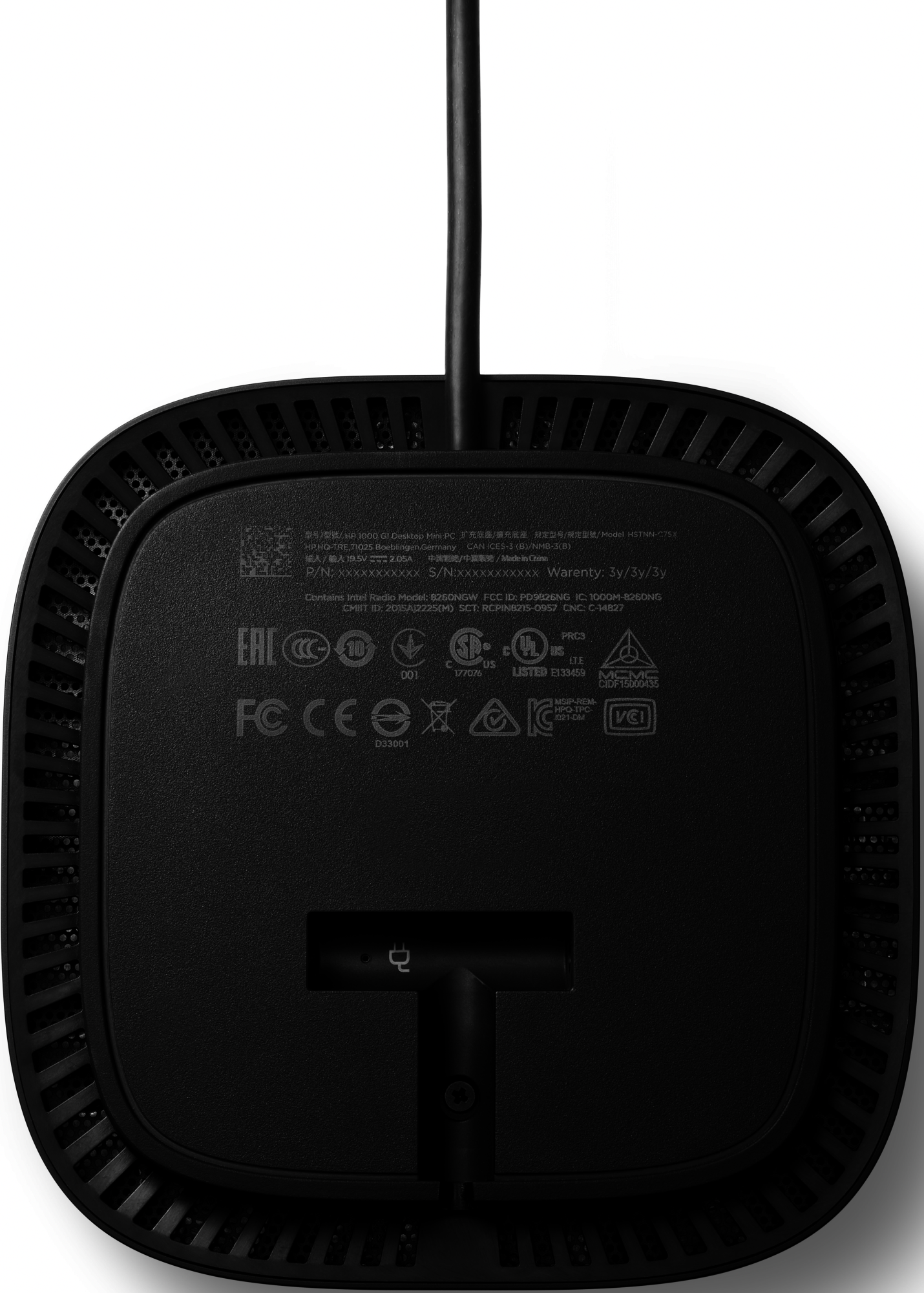 Ein schwarzes Gerät mit Lüftungsschlitzen und einem Kabel.