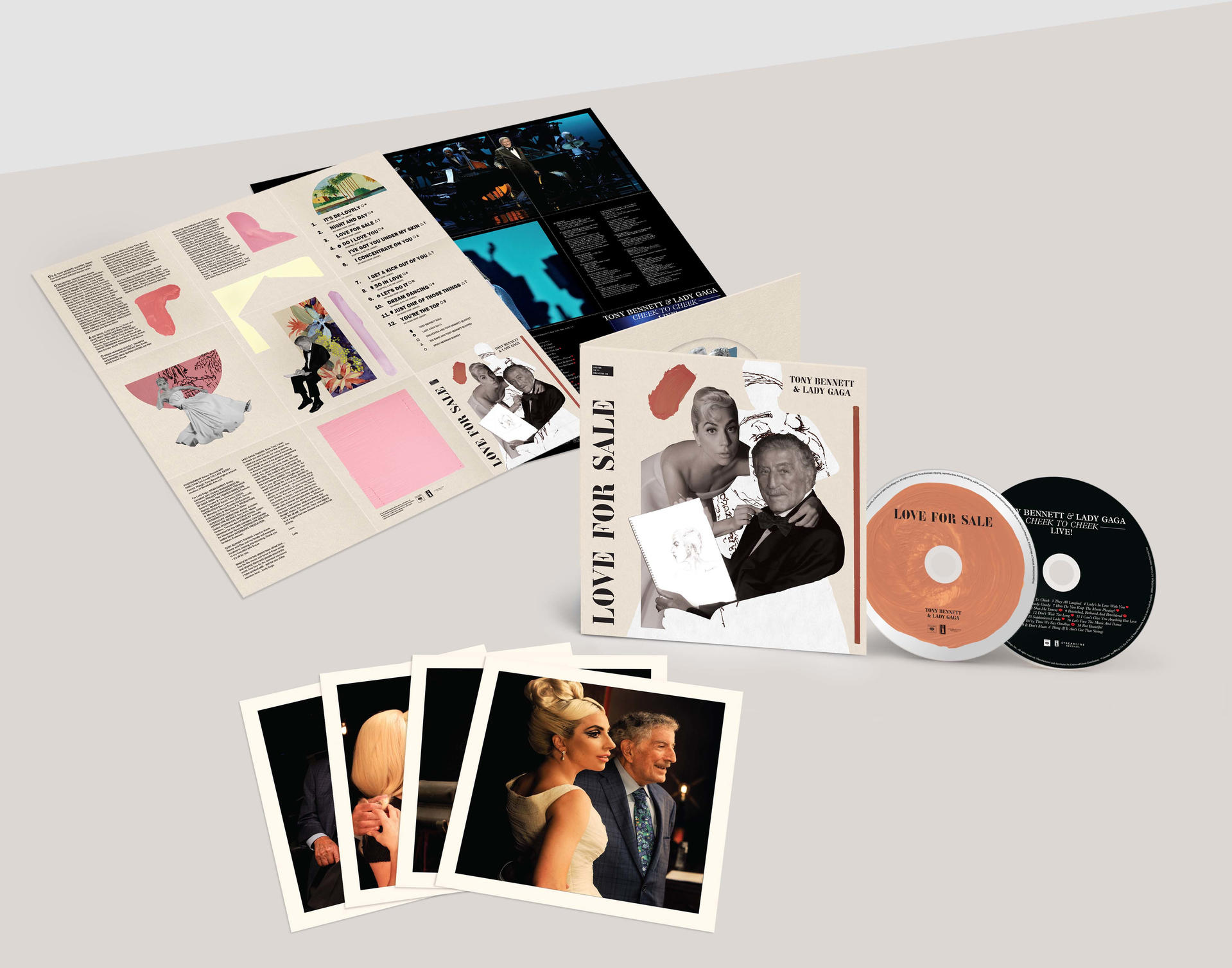 Emballage d'album, avec pochette d'album, photos et un CD, sur une surface blanche.