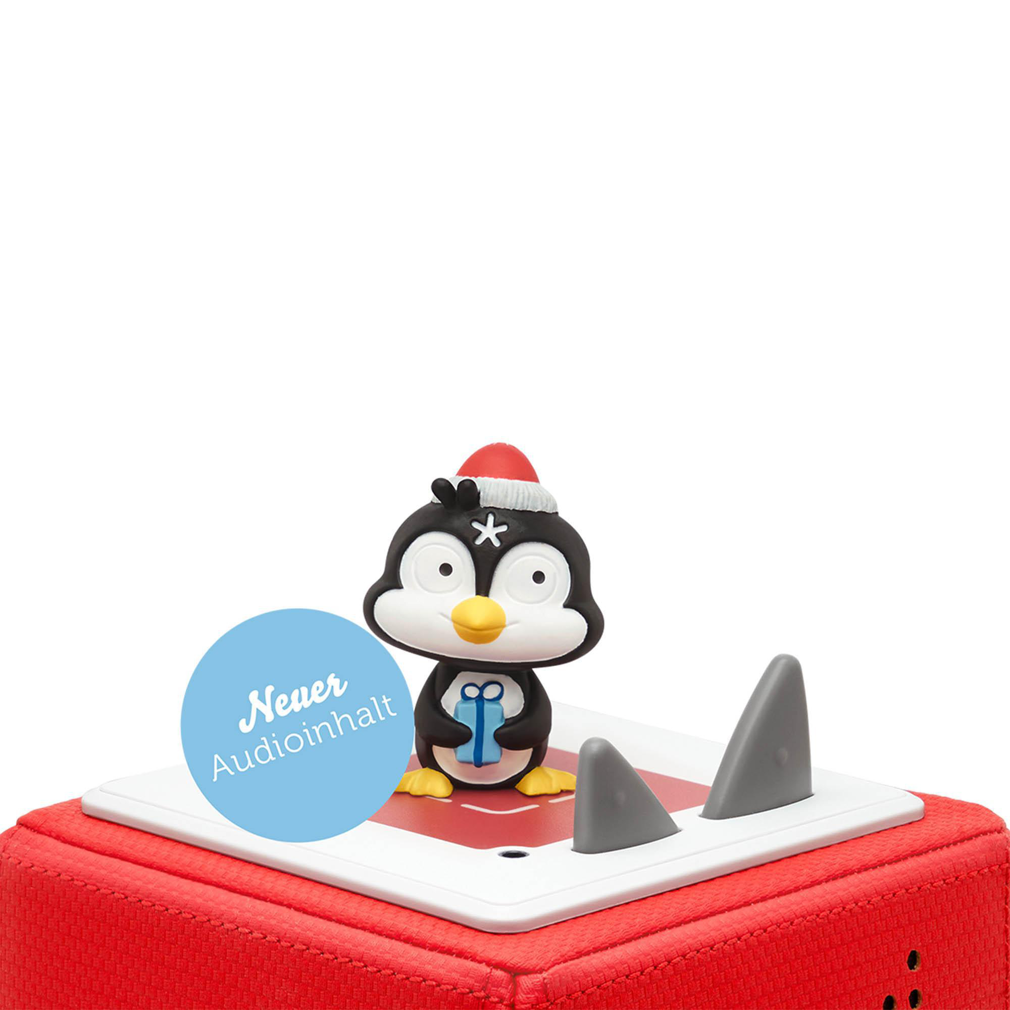 Eine Pinguin-Figur, die eine Geschenkbox hält, mit dem Label 'Neuer Audioinhalt'.