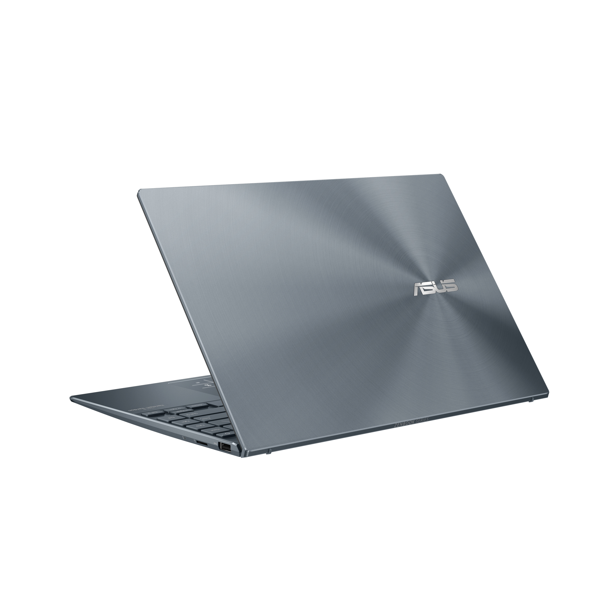 Una computadora portátil plateada, la parte posterior de la computadora portátil es visible. El logotipo de ASUS está en el medio.
