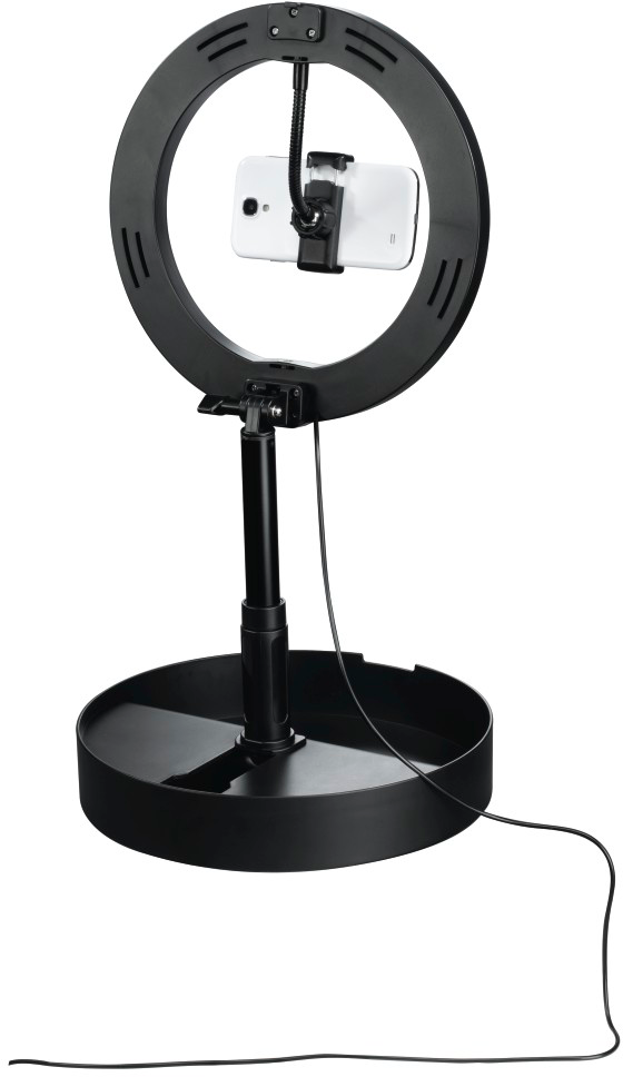 Black ring light with a phone mounted in the center, on a stand, with a black base and cable.
