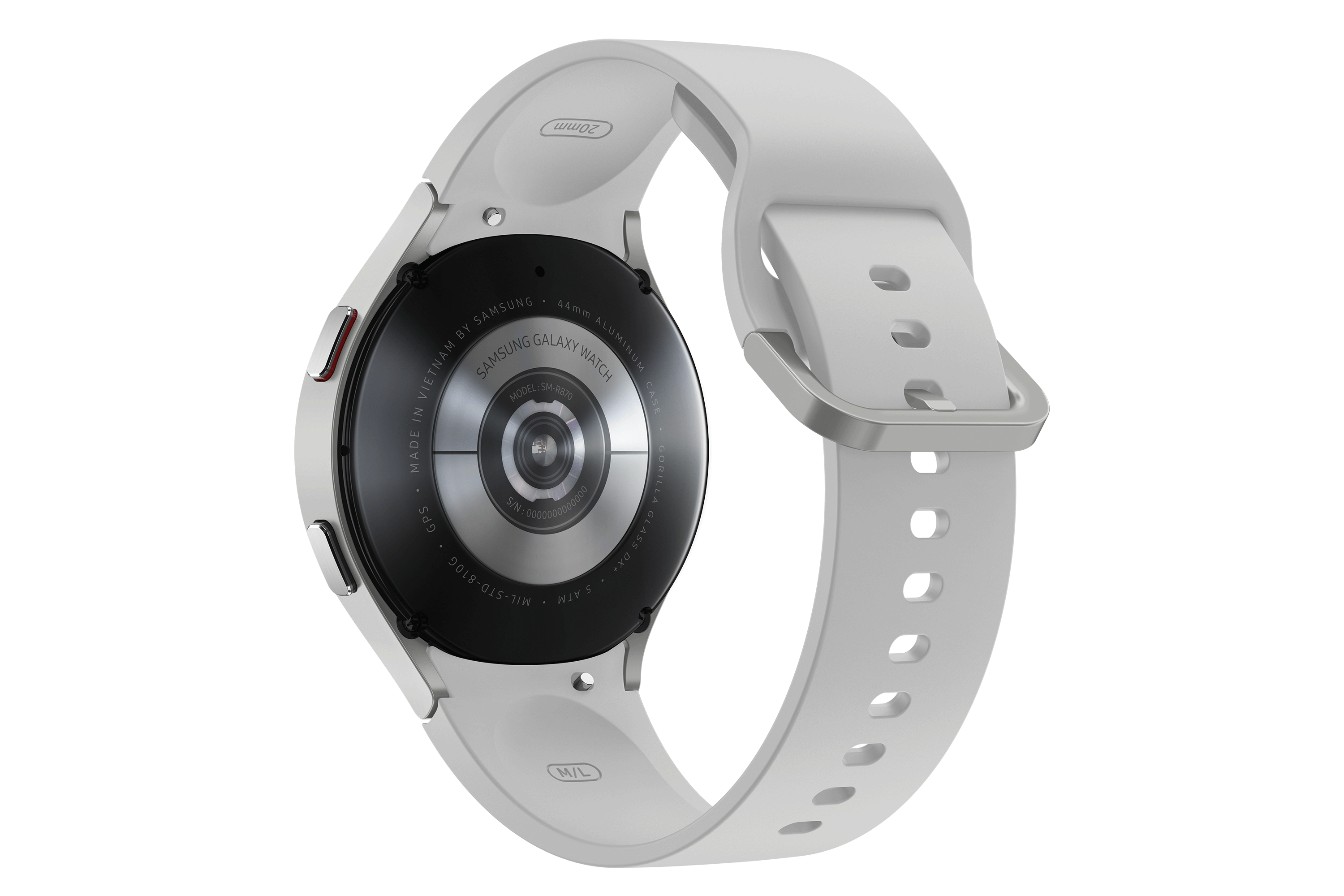 Egy fehér Samsung Galaxy Watch látható fehér szíjjal. Az óralap fekete, ezüst részletekkel.