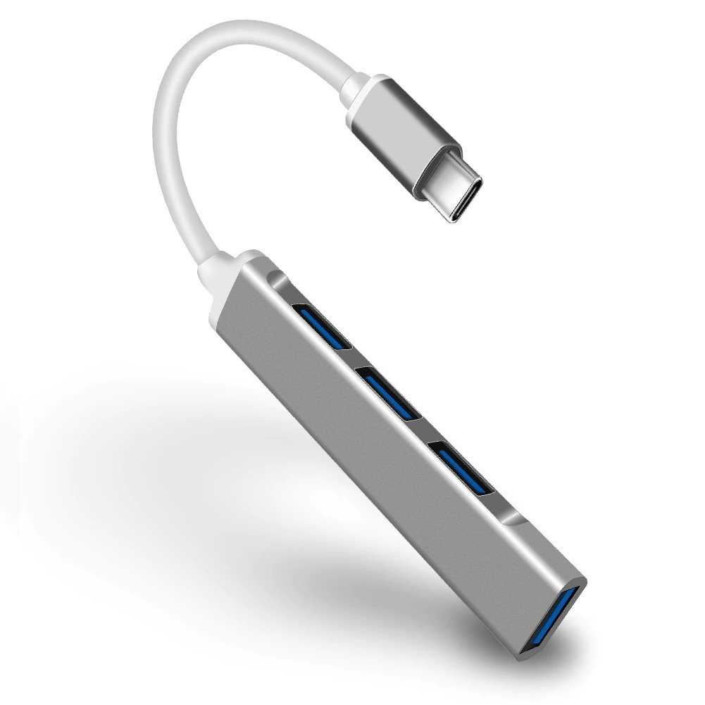 4 mavi USB portu ve bir USB-C konektörüne bağlı beyaz bir kabloya sahip gümüş bir USB hub.