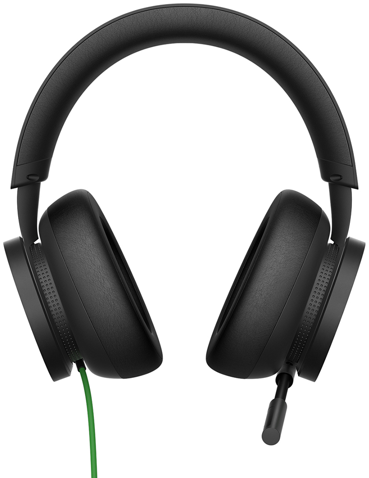 Black gaming headset with green cable. Isolated on white background.