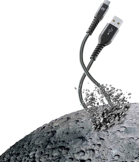 Un cavo di ricarica a mezz'aria, che rompe una pietra. Il cavo ha due estremità, nero e argento.