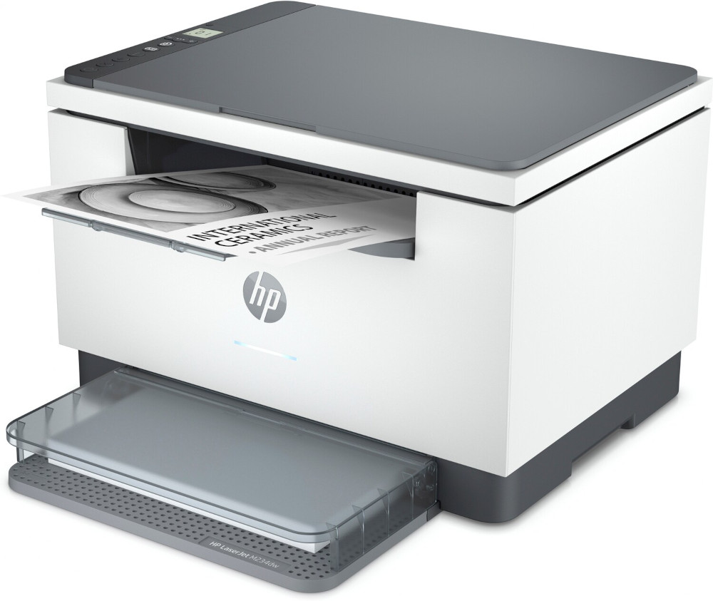 An HP LaserJet M234dw printer, white with gray accents, prints a document titled 'International Ceramics Annual Report'.