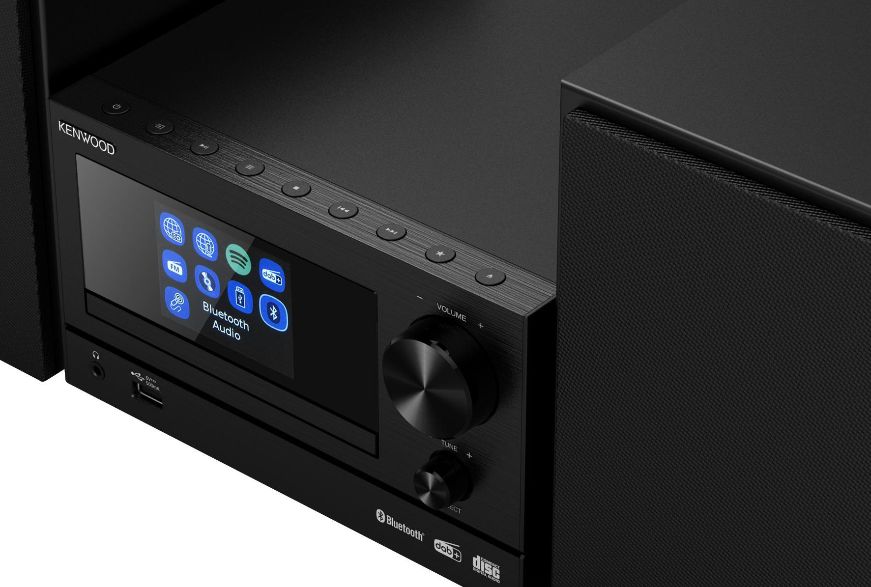 Ein schwarzes Kenwood Stereoanlage. Es hat einen Bildschirm, Tasten und einen Lautstärkeregler. Lautsprecher sind daneben.