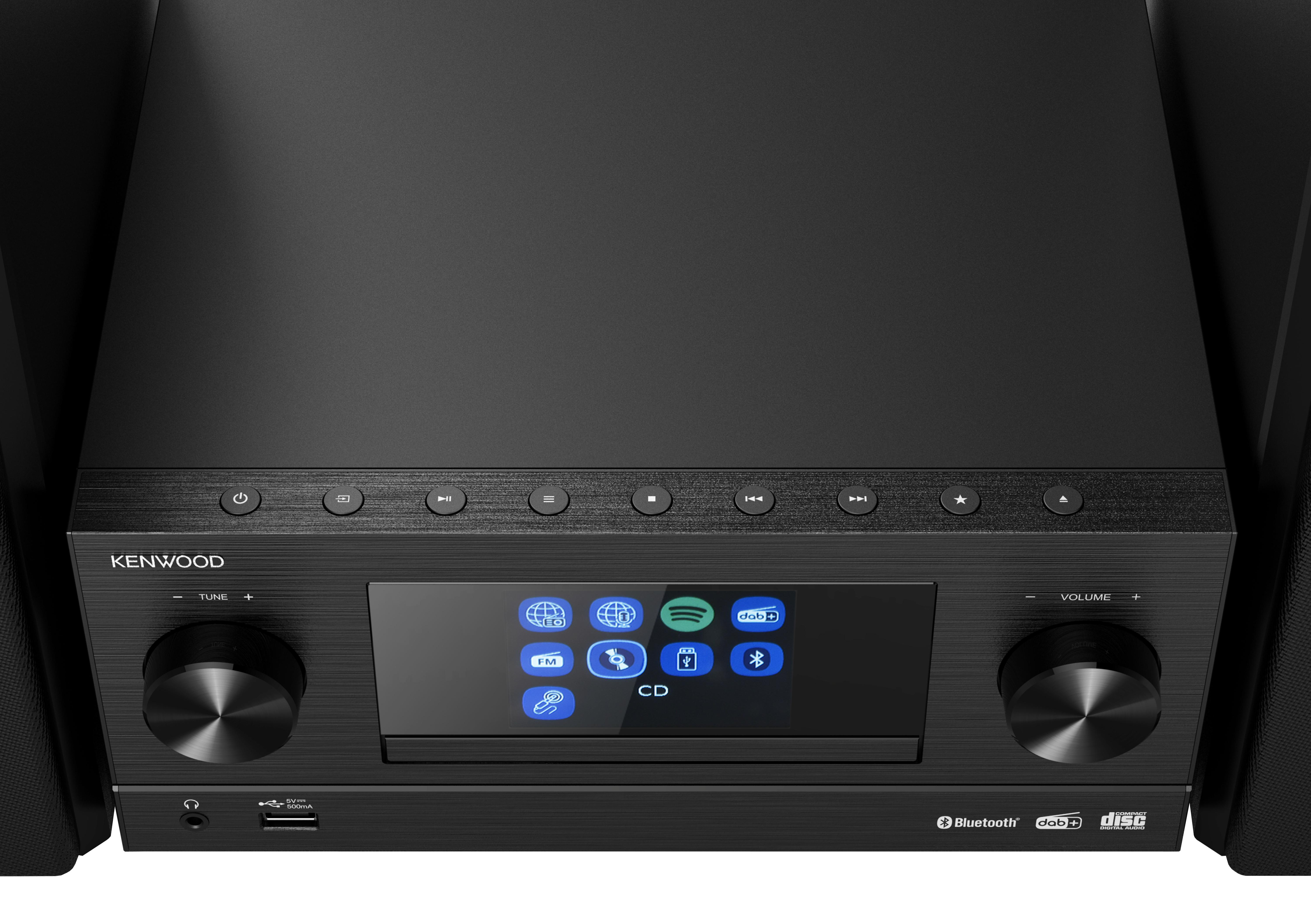 Ein schwarzes Kenwood-Stereosystem. Hat Knöpfe, einen Bildschirm und zwei Knöpfe. Schwarze Lautsprecher sind an den Seiten.