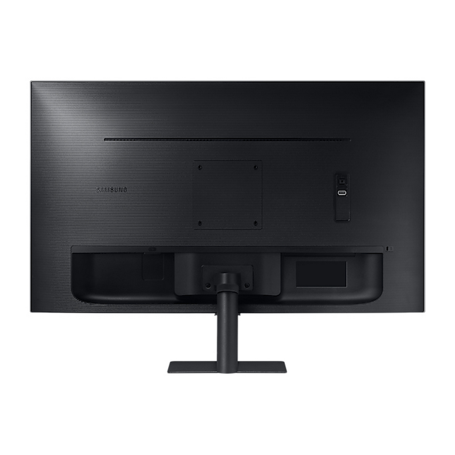 Parte trasera de un monitor de computadora negro con soporte; varios puertos y puntos de montaje.