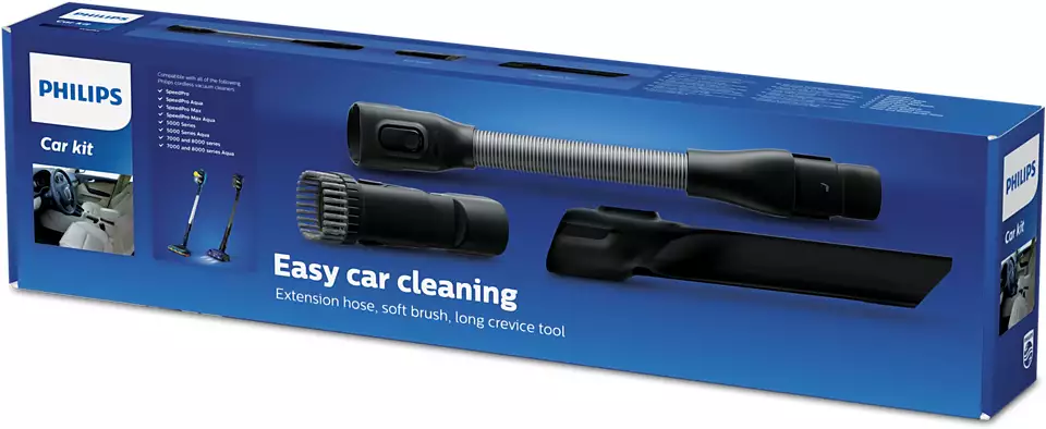Une boîte de kit voiture Philips avec accessoires de nettoyage, dont un tuyau, des brosses et un suceur.
