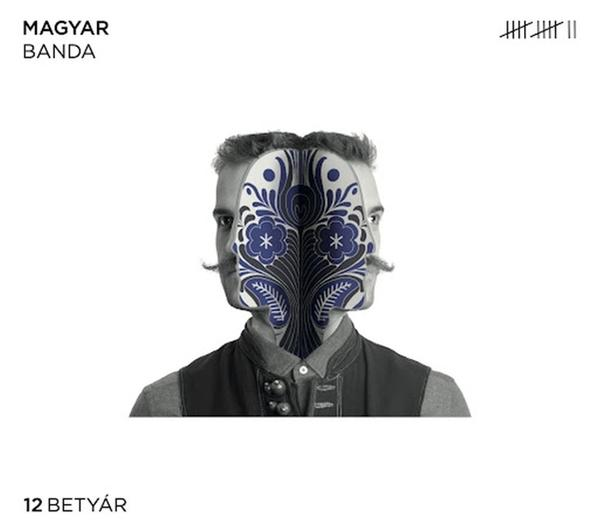 Album borító egy férfi arccal, virágmintával, és a 'MAGYAR BANDA 12 BETYÁR' szöveggel.