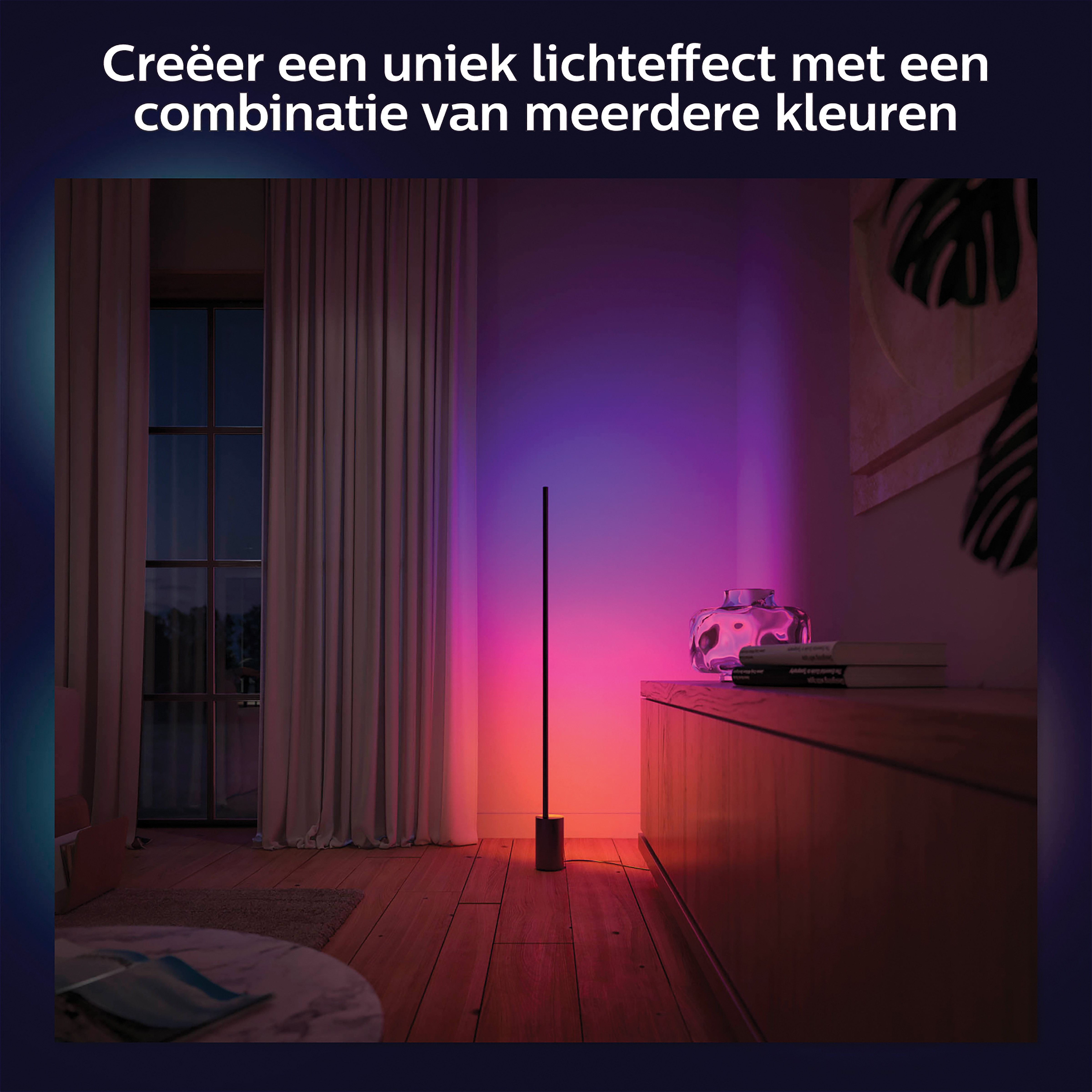 A room lit with colored lights. A tall floor lamp provides the light, creating a unique effect.