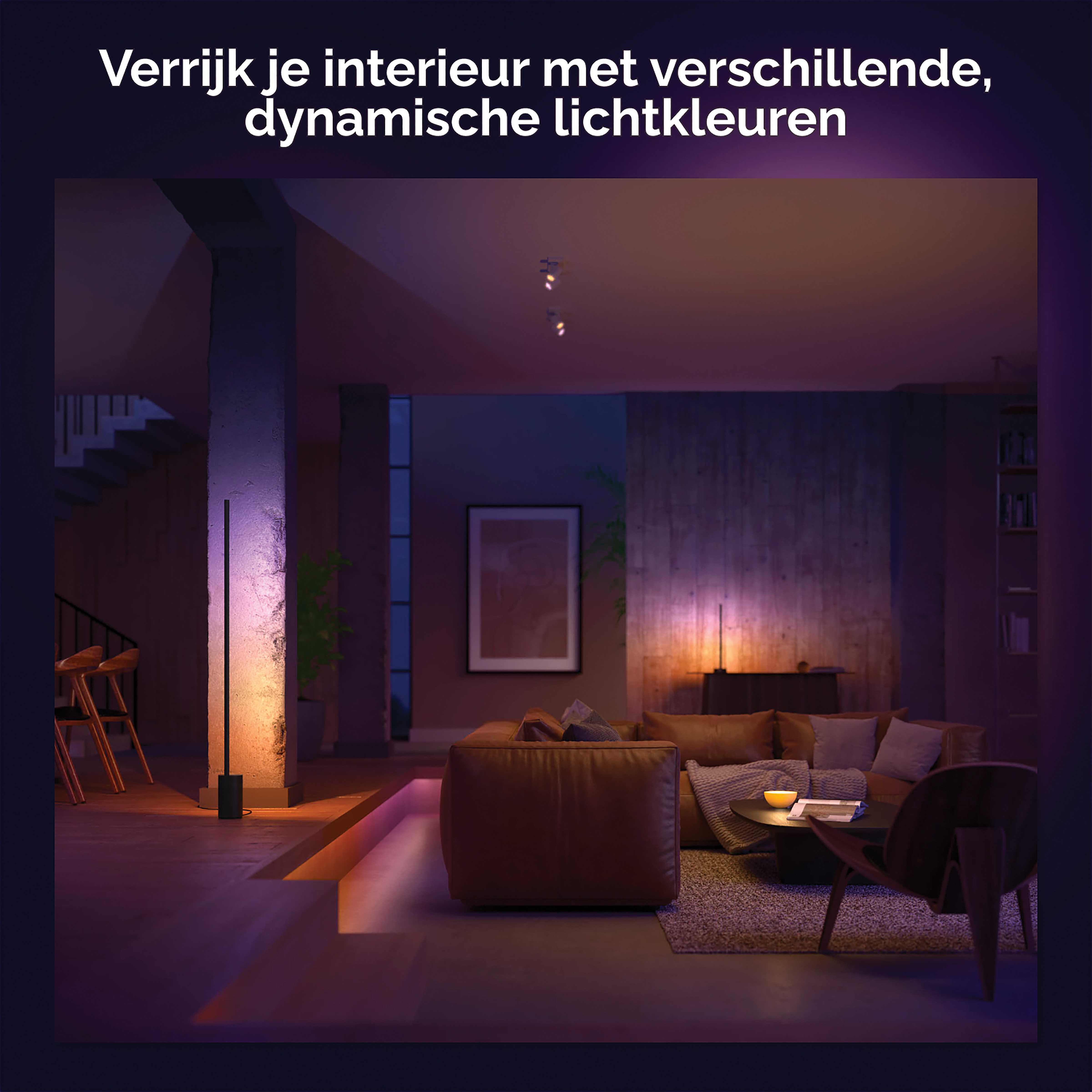 Living room lit with colorful lights from a modern lamp.