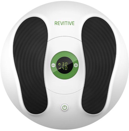 Masseur de pieds blanc avec coussinets noirs et écran vert.