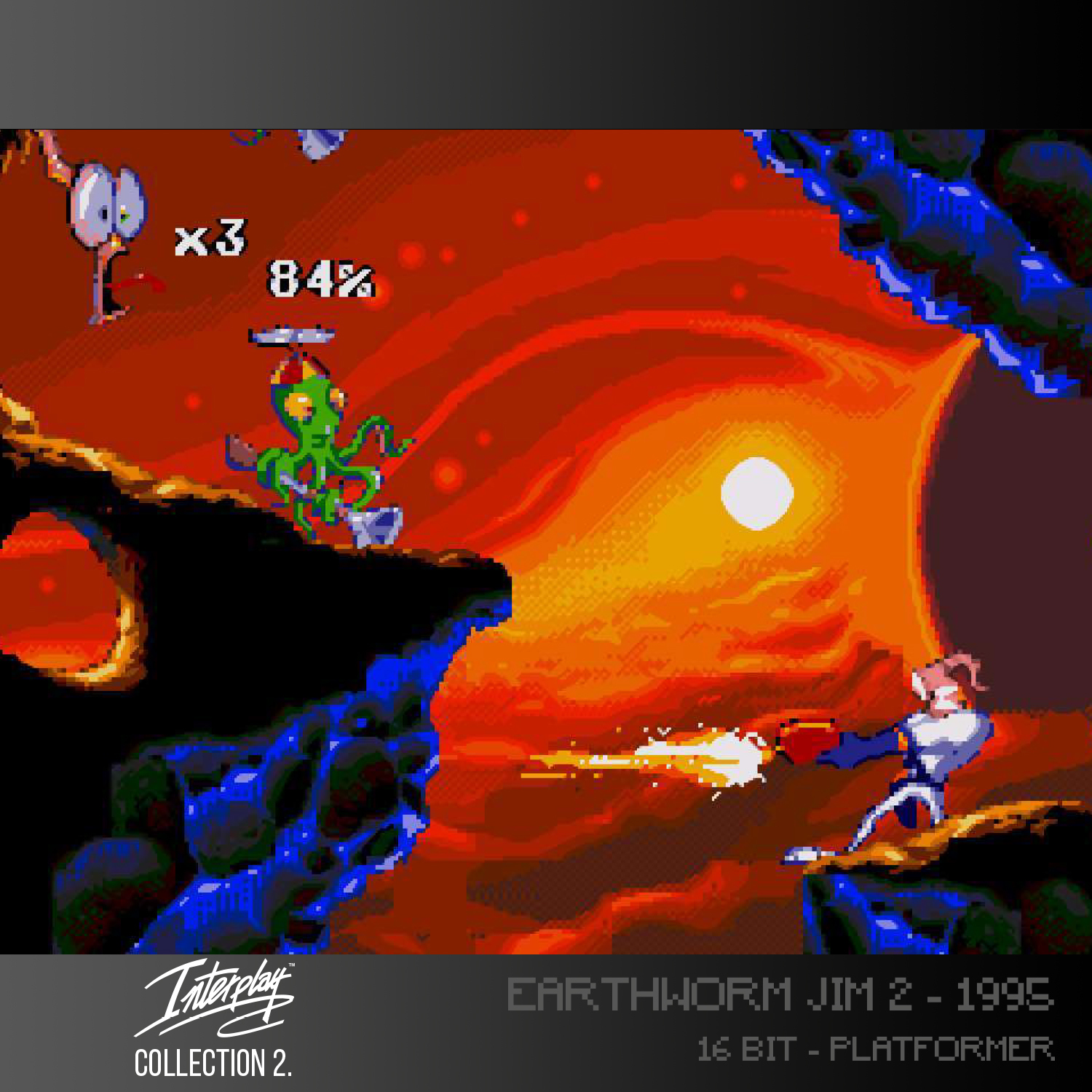 Eine Videospielszenen mit einem Wurm, der einen Laser abfeuert. Im Hintergrund ein grüner Alien und die Sonne.