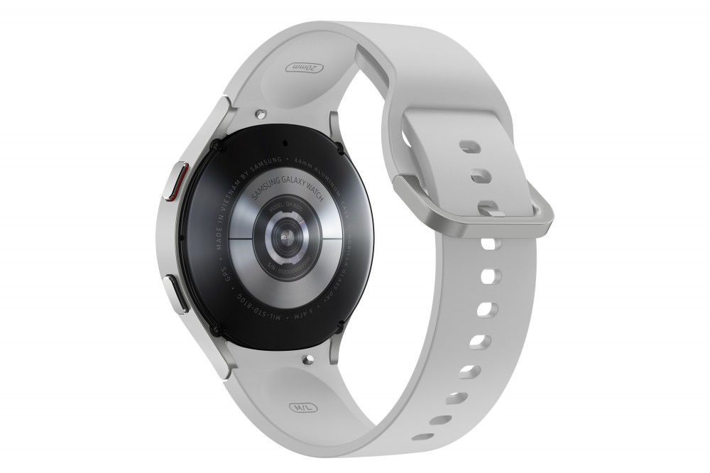 Egy fehér Samsung Galaxy Watch hátulról, fehér szíjjal.